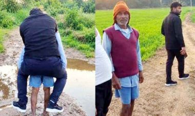 जूते को भीगने से बचाने पटवारी नाला पार करने बुजुर्ग की पीठ पर सवार, सोशल मीडिया पर वीडियो जमकर वायरल, सस्पेंड, ग्रामीणों ने खोले काले कारनामे